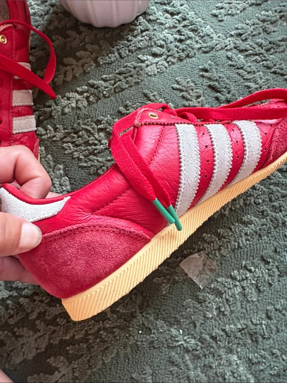 adidas women’s Red Sneakers with White Stripes